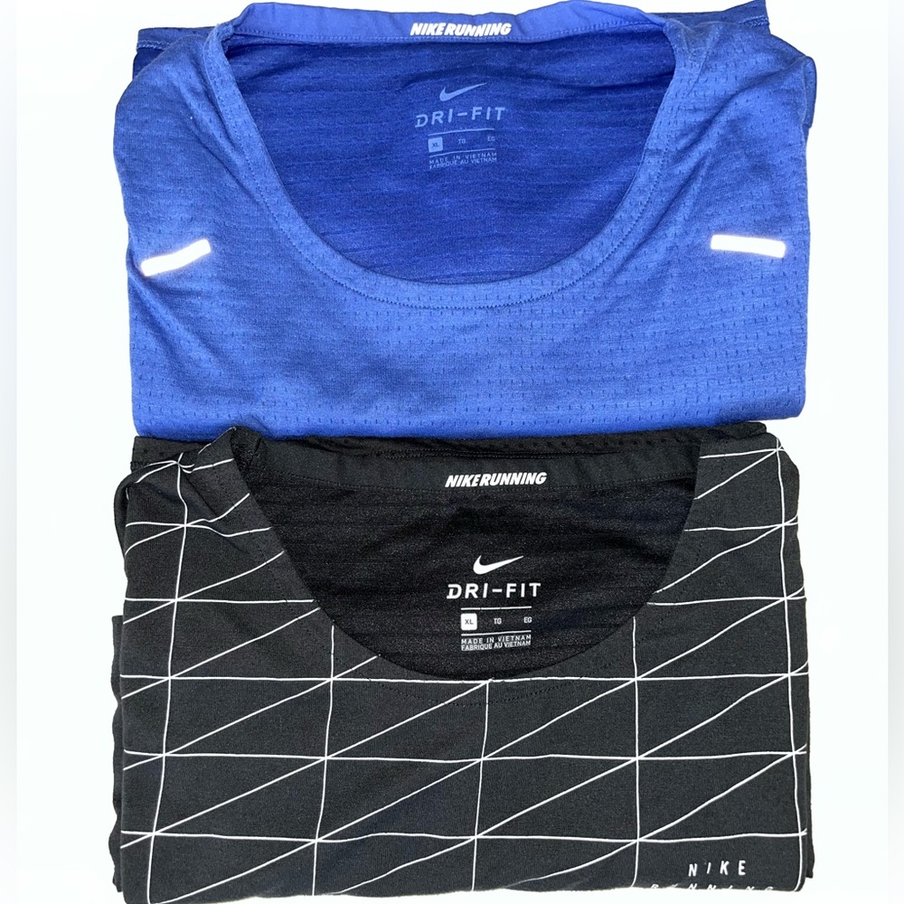 Two men’s Nike shirts
